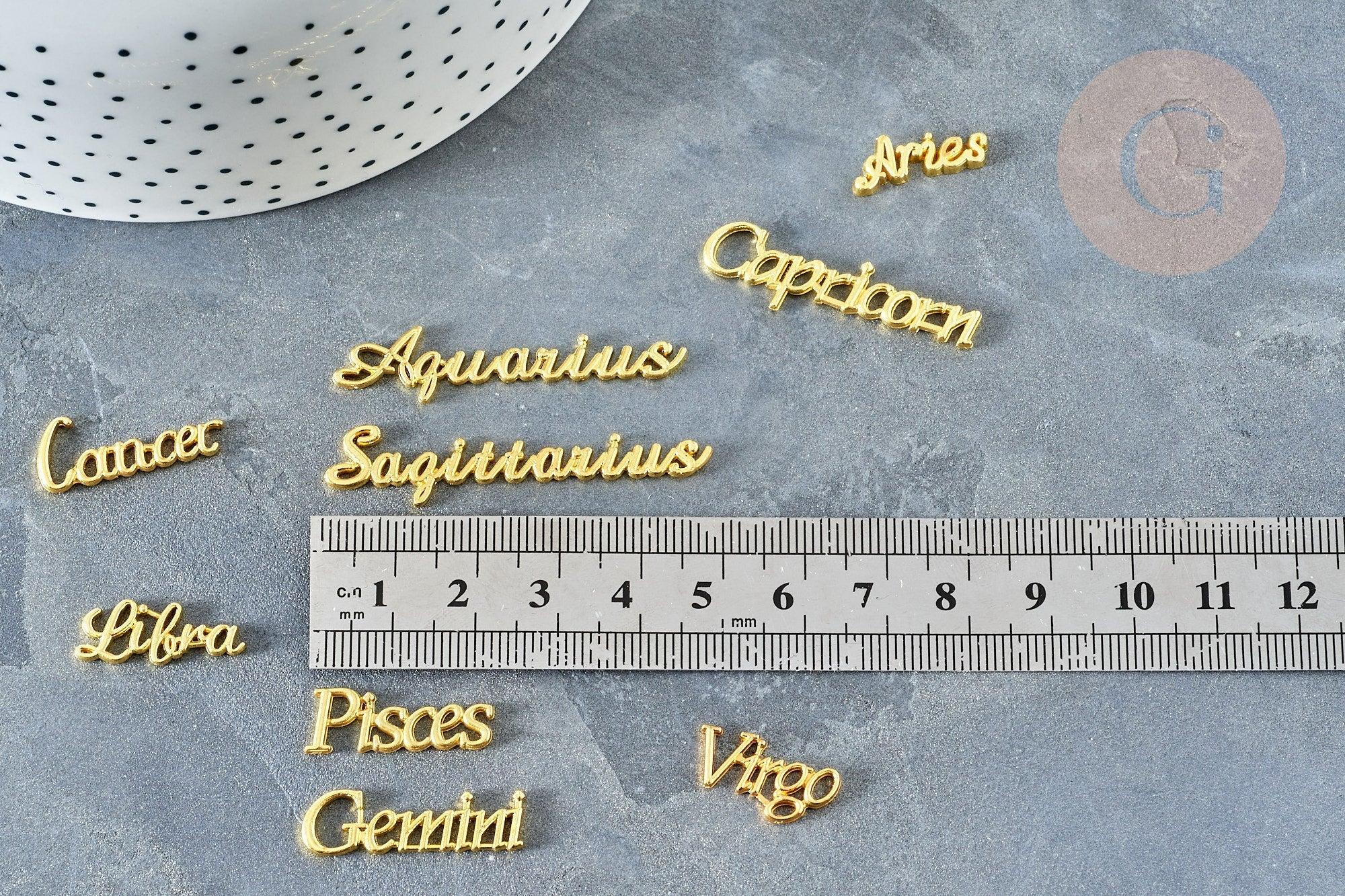 Elément à coller signe astrologique zamac doré 14-48mm, x1 (G3466)