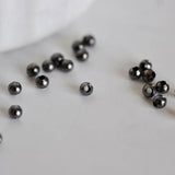 Perles intercalaires noires métalgun 3mm, x10 grammes (G2441)